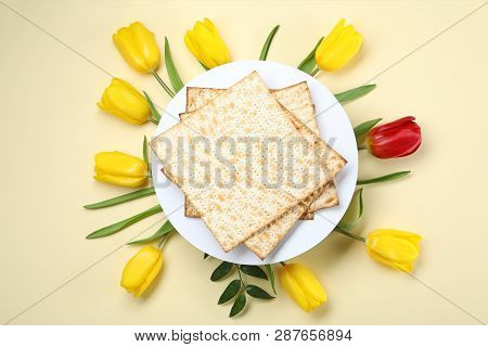 Composition With Matzo And Flowers On Color Background, Top View. Passover (pesach) Seder