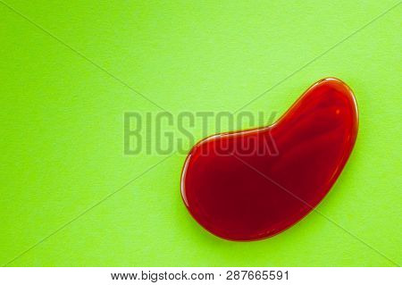 Guasha Scrapers For Body Massage According To The Ancient Method Shot On A Bright Green Background