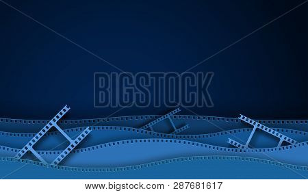 Paper Cut Cinema Decorations With Film Strip Frame Isolated On Blue Background. 35 Mm Camera Diaposi
