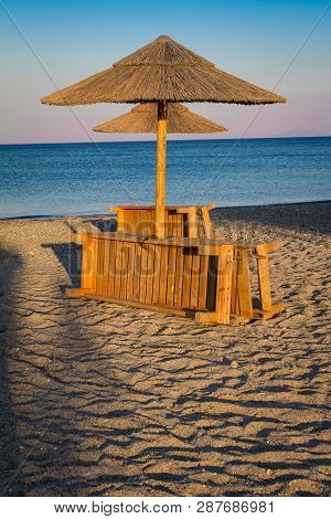 Beach And Sea View With Sunshades At Sunset Chillout Color Split Toning