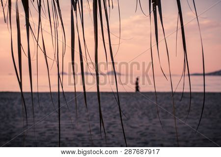 Beach And Sea View With Sunshades At Sunset With Silhouette Chillout Color Split Toning