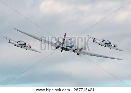 Payerne, Switzerland - August 30, 2014: Douglas Dc-3c Vintage Airliner N431hm Flying In Formation Wi