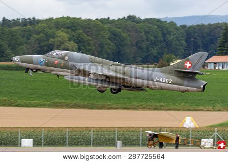 Payerne, Switzerland - August 29, 2014: Former Swiss Air Force Hawker Hunter T.68 Hb-rvw.