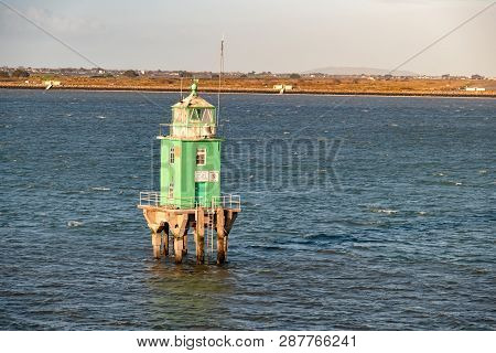 Green Buoy Tower Lighthouse At Dublin Harbour