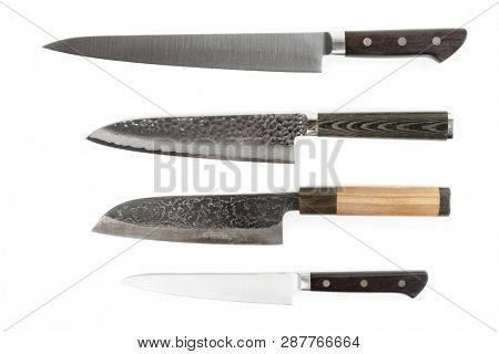 Set of four new and used knives, isolated on white baclground