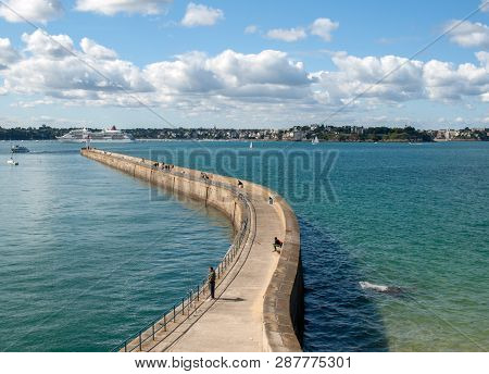 St Malo, France - September 14, 2018: View From The Ramparts At The Pier Mole Des Noire,  Lighthouse