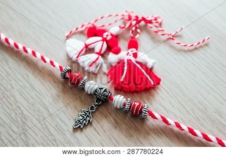 Bulgarian Traditional Spring Decor Martenitsa Bracelets, Wooden Background. Baba Marta Holiday, Back
