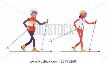 Sporty Man And Woman Skiing, Enjoy Winter Outdoor Activities On Ski Resort, Having Active Holiday, W