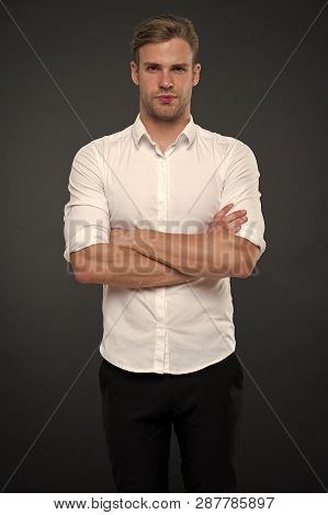 I Am Here To Help You. Man Shop Consultant Looks Confident And Hospitable. Man Calm Face Posing Conf