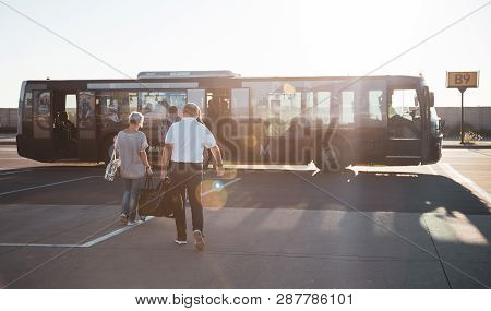 Johannesburg, South Africa, 28th February - 2019: Passengers Boarding Airport Transfer Bus