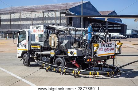 Johannesburg, South Africa, 28th February - 2019: Fuel Truck Containing Jet-fuel Filling Airplane.