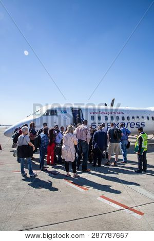 Johannesburg, South Africa, 28th February - 2019: Passengers Waiting To Board A Plane On The Tarmac.