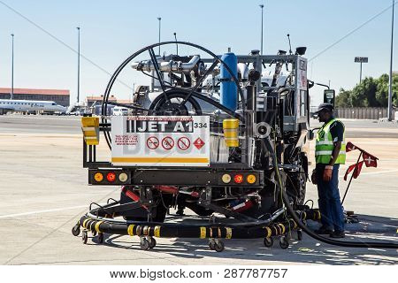 Johannesburg, South Africa, 28th February - 2019: Fuel Truck Containing Jet-fuel Filling Airplane.