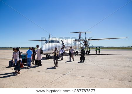 Johannesburg, South Africa, 28th February - 2019: Passengers Alighting From A Plane On The Tarmac.