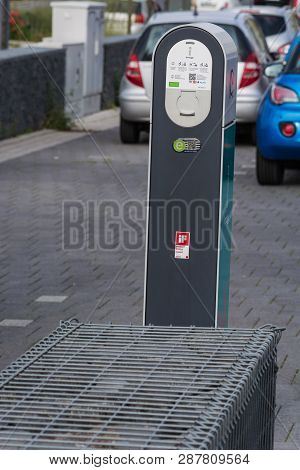 Heiligenhaus, Nrw, Germany - August 24, 2017: Parking In Heiligenhaus Charging Of Modern Electric Ca