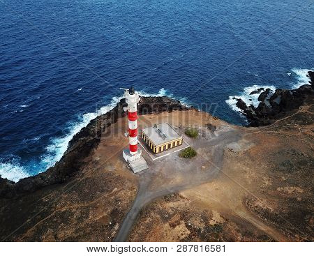 Aerial View Of The Lighthouse Faro De Rasca On The Tenerife, Canary Islands, Spain. Wild Coast Of Th