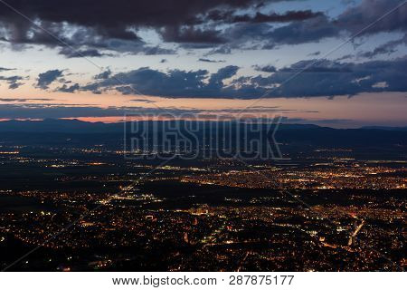 View To The Sofia City At Dusk. View From The Kopitoto Hill, Vitosha Mountain, Bulgaria.