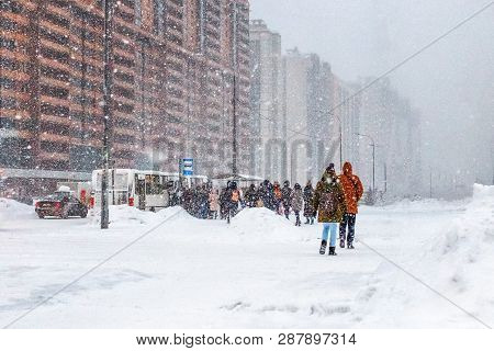 People Queue For Bus, Heavy Snow, Snowstorm, Rush Hour, Winter Slippery Roads, Poor Visibility