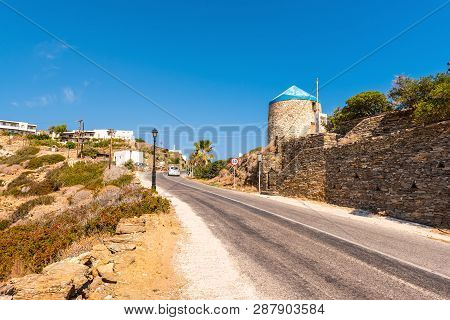Traditional Greek Windmill On The Way To The Village Of Kastro On The Island Of Sifnos In Greece.