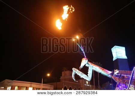 2/25/2019 Las Vegas, Nevada: Fire Breathing Music Playing Dancing Praying Mantis Sculpture on Freemont Street in Las Vegas Nevada. 
