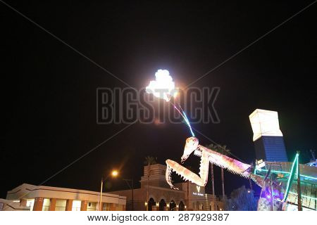 2/25/2019 Las Vegas, Nevada: Fire Breathing Music Playing Dancing Praying Mantis Sculpture on Freemont Street in Las Vegas Nevada. 
