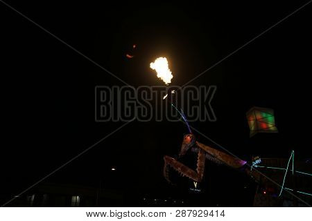 2/25/2019 Las Vegas, Nevada: Fire Breathing Music Playing Dancing Praying Mantis Sculpture on Freemont Street in Las Vegas Nevada. 
