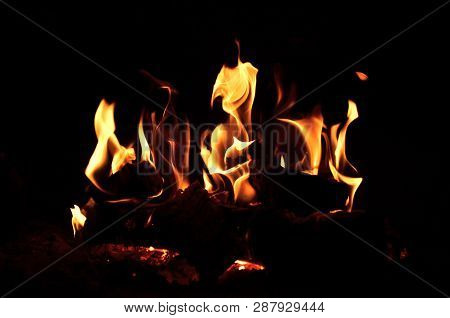 Yellw And Orange Flames On The Black Background