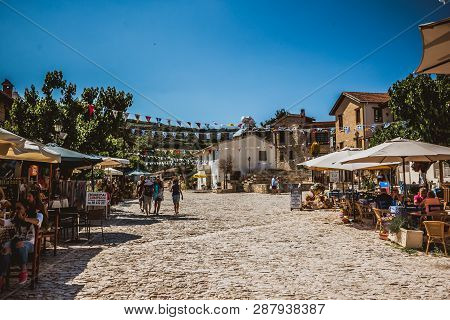 Pano Lefkara, Cyprus - May10, 2016: Tourists Walks Through A Village.