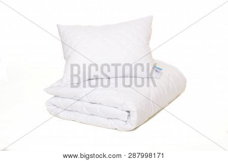 Rolled White Duvet Cover On  Isolated Background