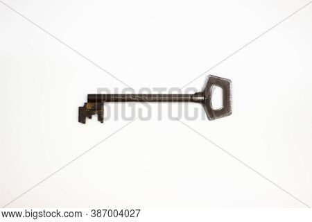 Old Key Isolated. Keys On Table. Ancient Keys, Used For Long Time. Vintage Key On White Background.