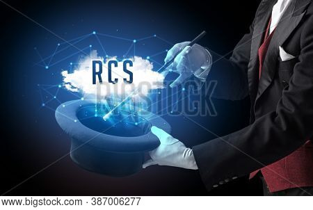 Magician is showing magic trick with RCS abbreviation, modern tech concept
