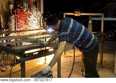 Plasma Sheet Metal Cutting Operator On A Rack