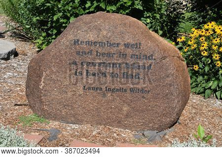 De Smet, Sout Dakota, August 5, 2020: An Engraved Rock Displays A Quotation From Laura Ingalls Wilde