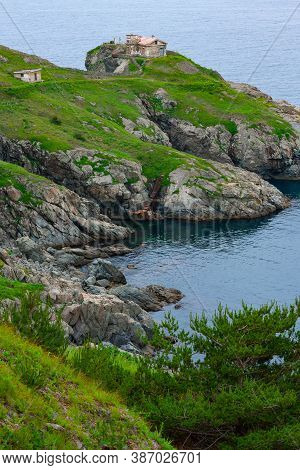 Huge Rocks On The Ocean, Sea Summer Landscape, Old Stone Building On A High Cliff, Gamova Lighthouse