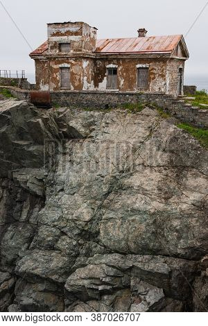 Huge Rocks On The Ocean, Sea Summer Landscape, Old Stone Building On A High Cliff, Gamova Lighthouse