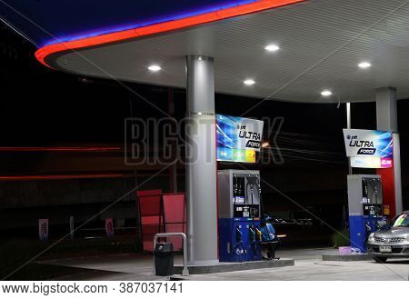 Muang, Pathumthani, Thailand Apr 26, 2018: Gas Dispenser Of Ptt Gas Station In Thailand On Dark Nigh