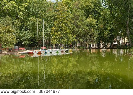 Reflection In The Water Of Boats In The Park D. Carlos I, In Caldas Da Rainha, Portugal