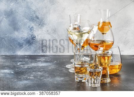 Selection Of Hard Strong Alcoholic Drinks In Big Glasses And Small Shot Glass In Assortent: Vodka, C