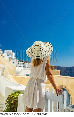 Woman on holidays in Santorini island in Greece
