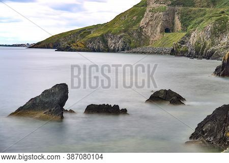 Bray To Greystones Cliff Walk. Long-exposure Shot Of Coastal Line In Bray, Co. Wicklow, Ireland