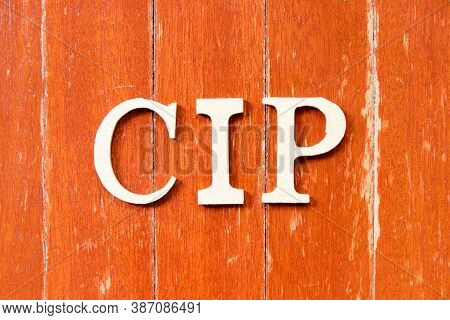 Alphabet Letter In Word Cip (abbreviation Of Carriage And Insurance Paid To) On Old Red Color Wood P