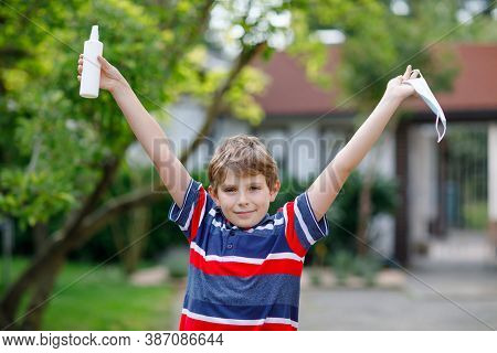 School Kid Boy With Medical Mask As Protection Against Pandemic Coronavirus Quarantine Disease. Chil