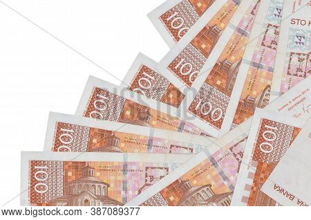 100 Croatian Kuna Bills Lies In Different Order Isolated On White. Local Banking Or Money Making Con
