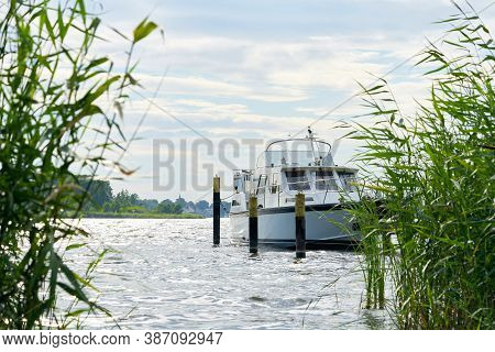 Yacht At A Pier On The River Havel Near Toeplitz In Germany