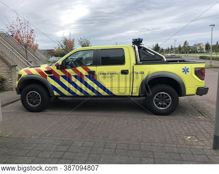Almere, The Netherland - September 27, 2020: Ford Raptor F150 In Dutch Ambulance Striping Parked On 