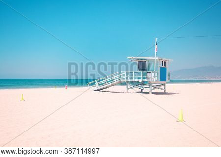 Pastel Toned Empty Beach Iwith Famous Vintage Wooden Lifeguard Hut In Santa Monica
