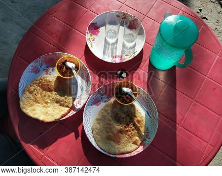 Indian Aloo Paratha Served On A Highway Restaurant. It's Unleavened Dough Rolled With A Mixture Of M