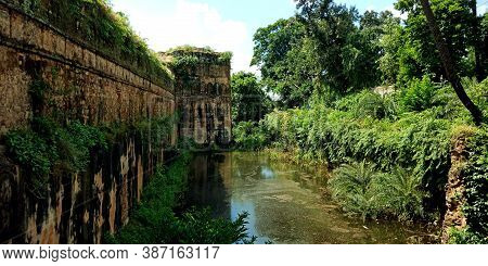 District Katni, India - October 10, 2019: Side Wall Water Flowing View At Ancient Fort In Vijayragha