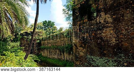 District Katni, India - October 10, 2019: Side Wall Water Flowing View At Ancient Fort In Vijayragha