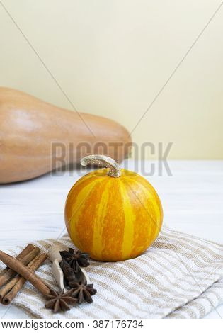 Small Pumpkins On White Wooden Background. Autmn Composition, Thanksgiving Day Concept. Halloween Fl